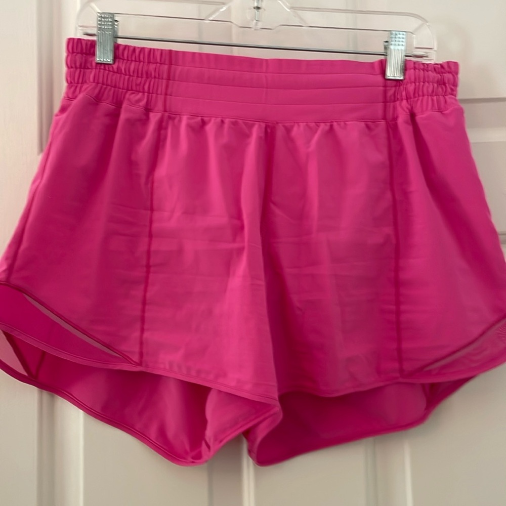 Lululemon lightweight running shirts with inside pocket.  Size 10